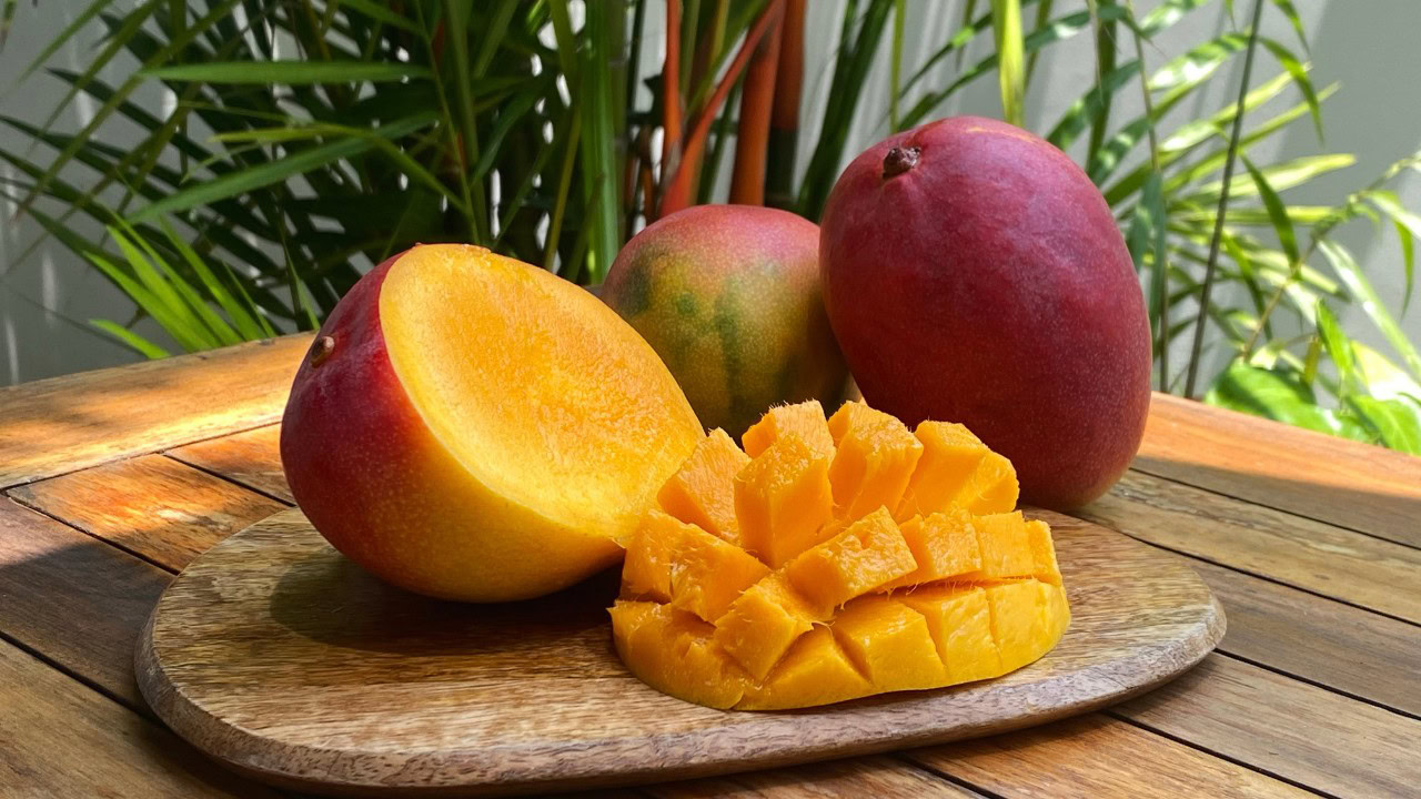 Delicious sliced ​​mango on the table.